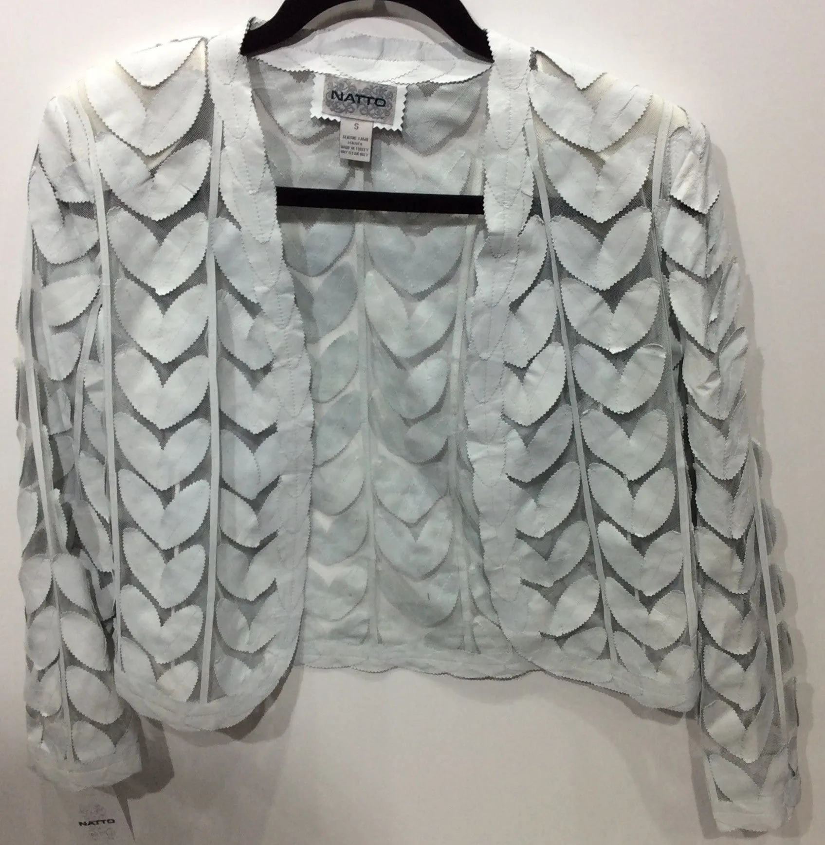 Laser cut leather jacket leaf pattern